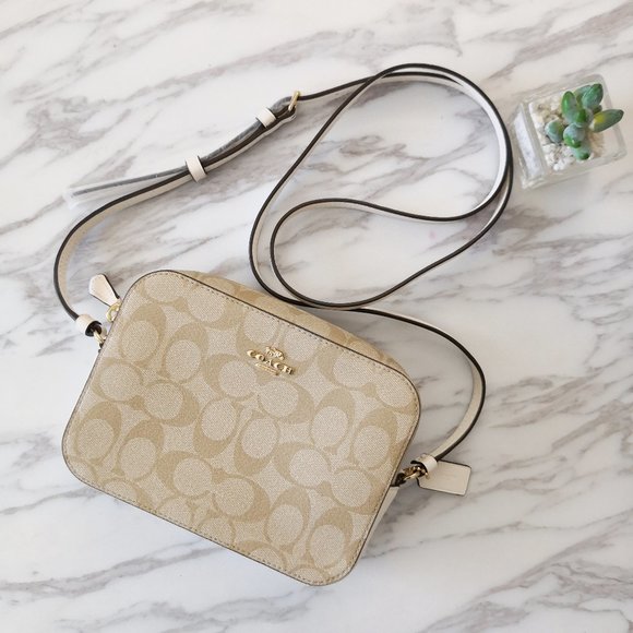 coach camera bag signature